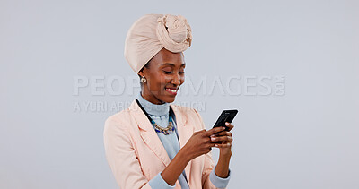 Buy stock photo Happy, typing and black woman with phone in studio for communication on a white background. Female person, user or texting with smile on smartphone for mobile chatting, conversation or social media
