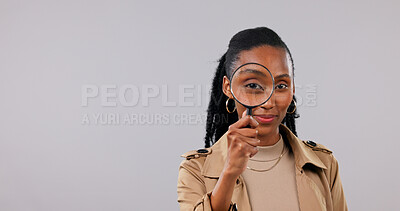 Buy stock photo Portrait, woman and detective in studio with magnifying glass, crime investigation and mockup space. Private investigator, black person and tools for inspection, search and find on white background.