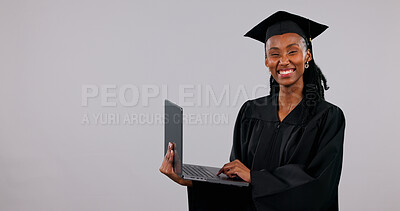 Buy stock photo Graduation, laptop and portrait of black woman in studio for education announcement or information. Computer, space and university sign up with happy student on white background for online course