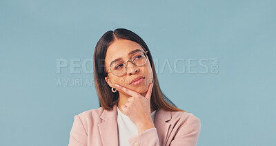 Buy stock photo Business, woman and thinking with idea in studio for decision or option on a blue background. Thoughtful, female person or employee contemplating with choice for company solution or problem solving