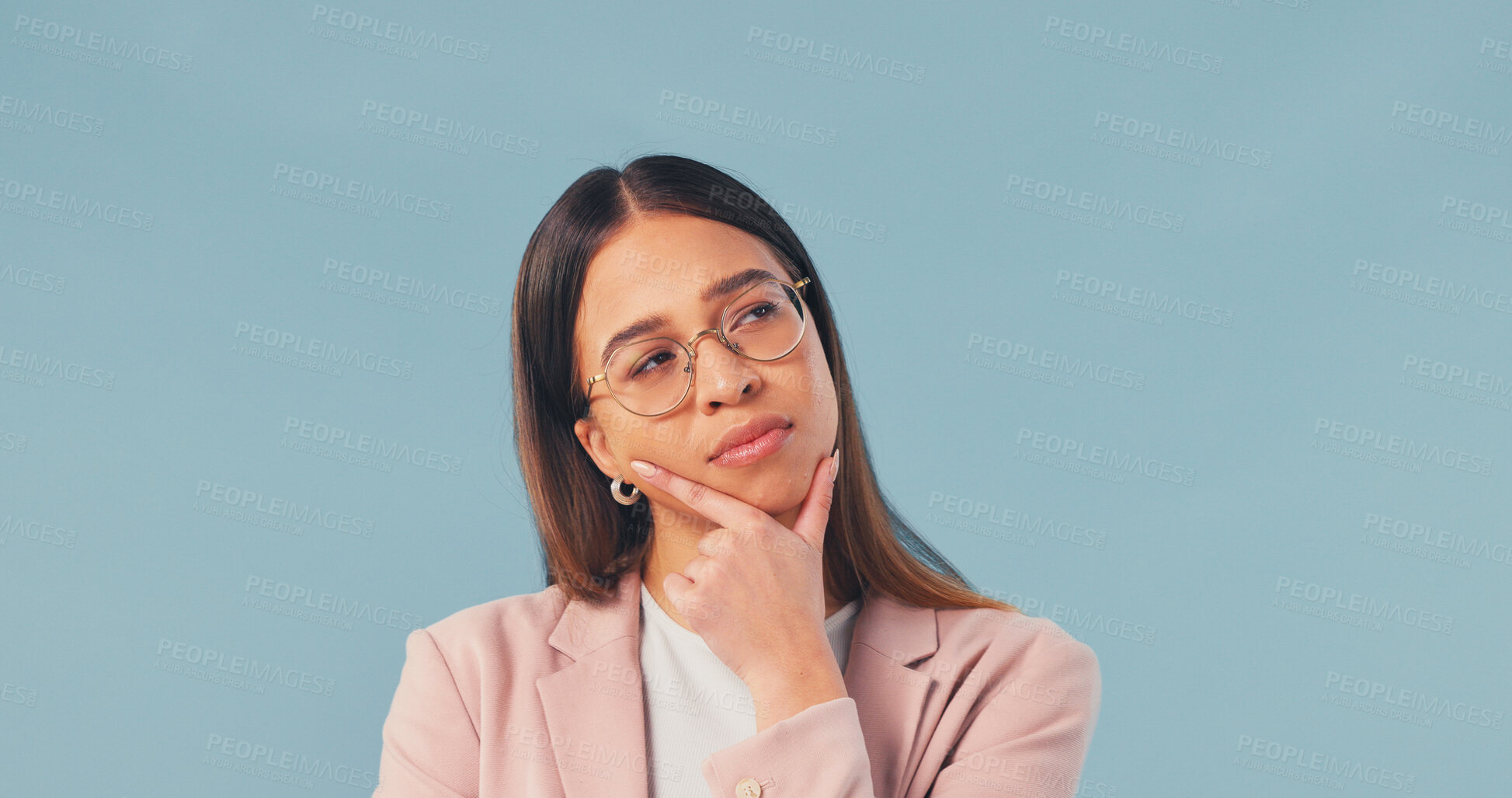 Buy stock photo Business, woman and thinking with idea in studio for decision or option on a blue background. Thoughtful, female person or employee contemplating with choice for company solution or problem solving
