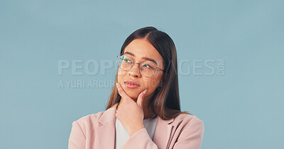 Buy stock photo Business, woman and thinking with plan in studio for decision or option on a blue background. Thoughtful, female person or employee contemplating with choice for ideas, solution or problem solving