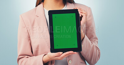 Buy stock photo Tablet, woman and hands with green screen for marketing mockup on a blue studio background. Female person, employee or presentation with technology display for advertising or app review on space