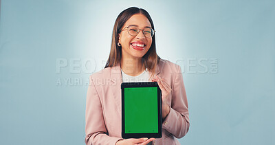 Buy stock photo Tablet, portrait and happy woman with green screen in studio for marketing on a blue background. Female person, employee or smile with technology display or glasses for advertising on mockup space
