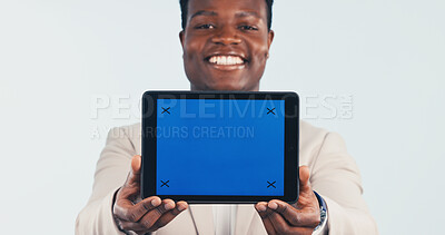 Buy stock photo Happy, portrait or black man with tablet screen mockup in studio for advertising on a white background. Male person, employee or smile with technology display or blue chromakey for marketing on space