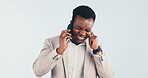 Frustrated, noise and black man with phone call in studio for bad reception on a blue background. Male person, loud or listening with smartphone speaker for poor signal, network connection or volume