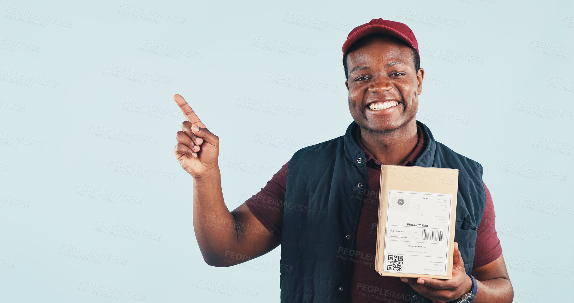 Buy stock photo Pointing, portrait and delivery man in studio for shipping news, advertising or ecommerce info. Mockup, happy and African person with space for logistics, courier service and box on white background