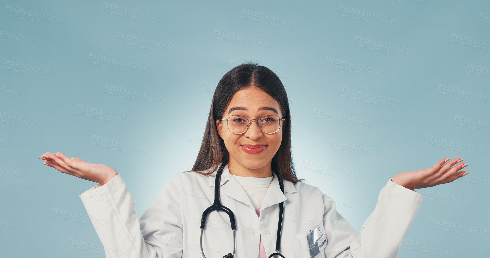 Buy stock photo Doctor, shrug and portrait of woman in studio for confused, medical opinion and treatment option. Healthcare review, mockup space and comparison with person on blue background for decision and unsure