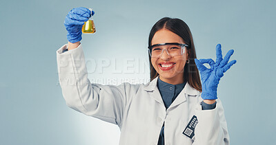 Buy stock photo Science, liquid and portrait of woman with okay sign for chemistry, experiment and medical research. Pharmaceutical, happy and person with sample, success and vaccine approval on studio background