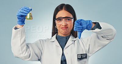 Buy stock photo Science, liquid and portrait of woman with thumbs down for mistake, chemistry fail and bad results. Pharmaceutical, emoji and person with sample, medical research and error on studio background