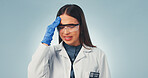 Headache, science and woman in studio with fatigue, burnout and migraine for pharmaceutical mistake. Space, healthcare and person with head pain, stress and pressure for lab study on blue background