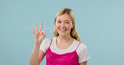 Buy stock photo Portrait, sign language and smile of woman in studio for communication, counting or gesture. ASL, feedback and friendly with happy person on background space for answer, conversation or review