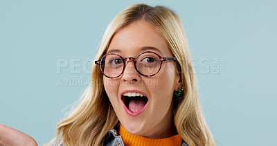 Buy stock photo Glasses, portrait and surprise with woman in studio for reaction to announcement or good news. Facial expression, shock or wow with excited person on background space for discount or promotion
