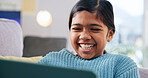 Laugh, streaming or girl on sofa with tablet, cartoon series or online game on weekend break. Happy, multimedia or child in house with tech, comedy entertainment or playing in digital competition.