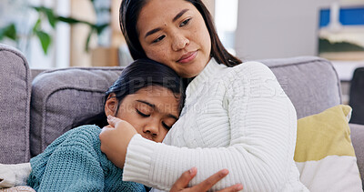 Buy stock photo Mental health, mother and girl on sofa with support, parent comfort and help with anxiety trigger. Love, childcare and family in house with embrace, tender moment and empathy with sad emotions.