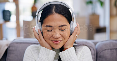 Buy stock photo Music, happy woman and relax with headphones in home for audio streaming, album release or peaceful. Smile, person or listening with tech in living room for calm sound, radio subscription or playlist