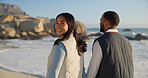 Love, smile and couple at beach with loyalty, care and connection on summer vacation getaway. Man, woman and bonding with happy partner by sea for relationship security, portrait or travel on holiday