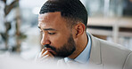Thinking, business and man in office with concern, bad news and mistake for financial loss. Thoughts, male person and stress in workplace with computer, bookkeeping error and solution for debt crisis
