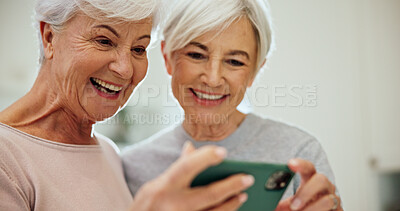 Buy stock photo Friends, laugh and old women with phone in home, nostalgia or watch video together for past memory. Mobile, happy people and funny post on internet for bonding, meme or comedy with joke in retirement