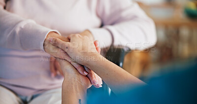 Buy stock photo Caregiver, holding hands and comfort for patient in wheelchair, help and healthcare in nursing home. Assisted living, nurse and support for senior person with disability, elderly care and kindness