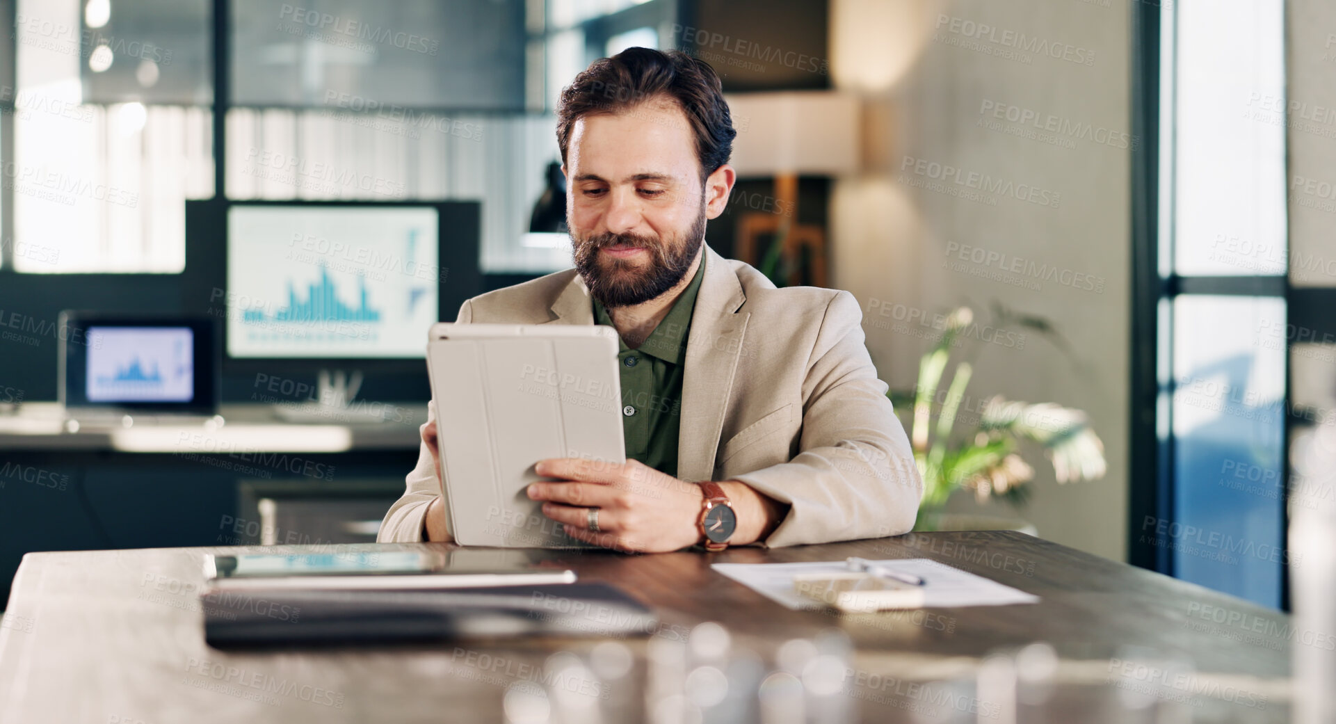 Buy stock photo Business, man and reading in office with tablet, research and data analysis for company revenue. Smile, male person or graphs in workplace with tech, audit report and information for financial profit