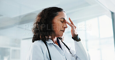 Buy stock photo Doctor, tired woman and stress in hospital for healthcare pressure, burnout and overwhelmed with loss. Mature person, medical professional or fatigue in clinic, exhausted or overworked with challenge