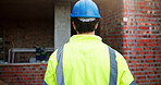 Engineer, back and inspection with man at construction site for building progress, remodeling and expansion. Architecture, renovation process and planning with person outdoor as contractor or foreman
