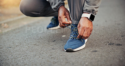 Buy stock photo Outdoor, hands and tying shoes for fitness, getting ready and safety measure for training. Start workout, man or runner tie sneaker for exercise preparation, body development or wellness on road