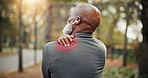 Back, old man and shoulder pain in nature for fitness, accident or muscle strain from exercise. Senior person, discomfort and red glow at park with joint cramps, injury and burnout from cardio sports