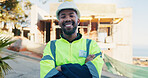 Crossed arms, portrait and black man at construction site for building, safety or civil engineering. Contractor, happy and person in ppe, helmet and confident for career, renovation or infrastructure
