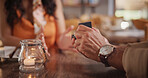 Couple, hands and proposal in restaurant, date and relationship commitment with ring and connection. Love, celebration and asking for marriage, engagement and people in diner or bonding with partner