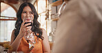 Wine, couple and woman in restaurant for date, bonding and celebrate anniversary together. Happy, fine dining and people with drinks for romantic dinner, relationship and listening for conversation