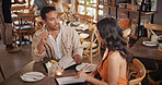 Talking, date and couple in restaurant for conversation, bonding and celebrate anniversary together. Above, fine dining and man with woman for romantic dinner, relationship and connection for love