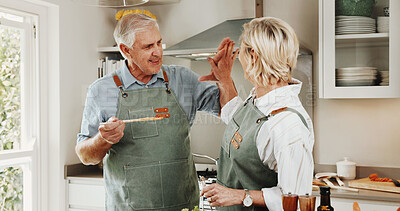 Buy stock photo Cooking, success and senior couple with high five in kitchen for help, bonding and done with supper. Marriage, happy and man with woman celebrate with taste for dinner, lunch and meal prep in home