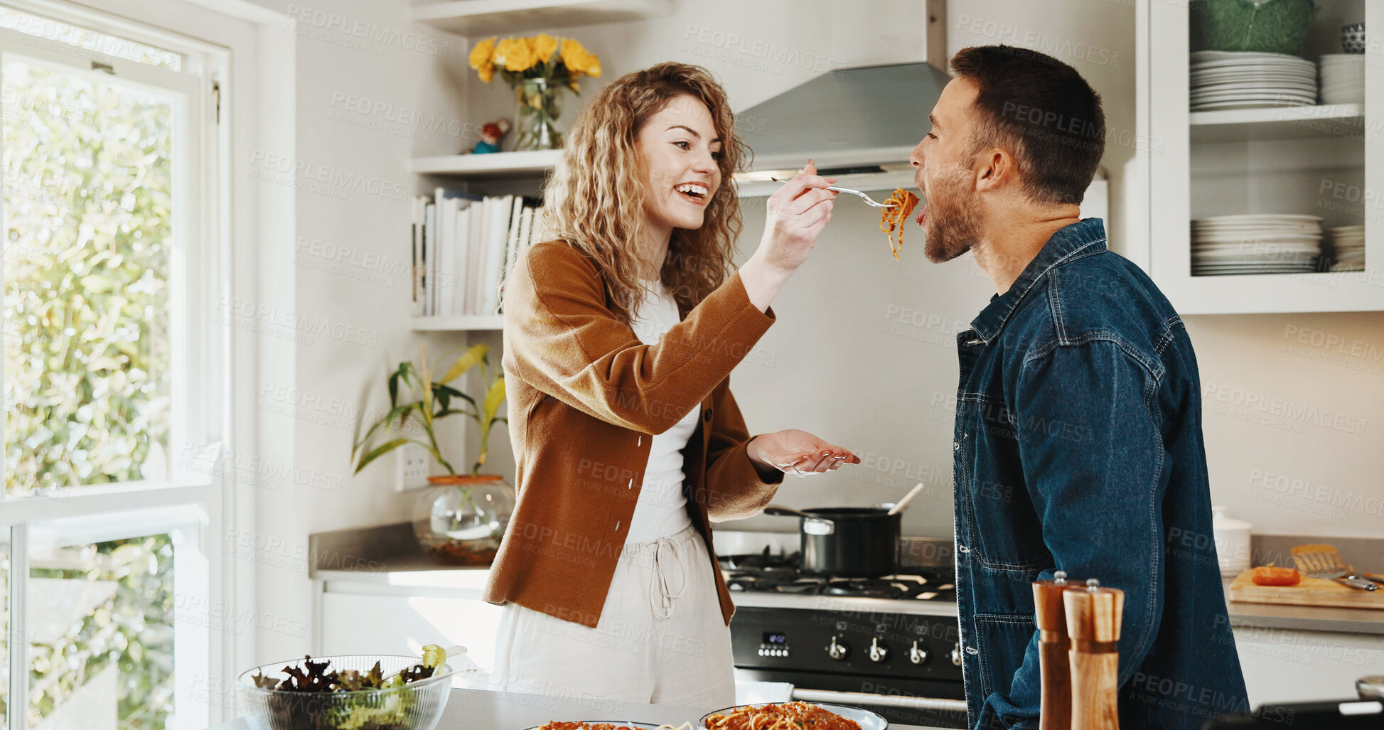 Buy stock photo Cooking, support or couple in kitchen with taste, fun connection or bonding together in meal prep. Love, food sampling or people with romantic moment, happy relationship or culinary hobby in house.