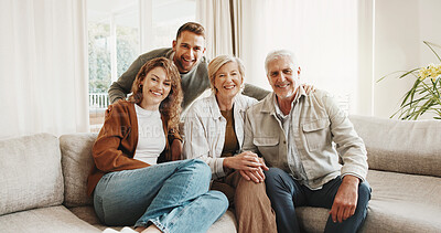 Buy stock photo Family, portrait and happy in home for bonding, senior parents and adult siblings with relax on couch. Smile, care and love with healthy relationship, old people with son and daughter in house