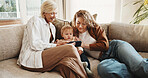 Happy, family and toddler at house with phone, baby pictures and watching cartoon for bonding. Mother, grandmother and child in lounge with mobile, streaming video and browsing for nursery rhymes 