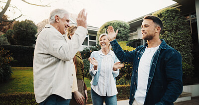 Buy stock photo Happy, celebration and family outdoor by house for applause excited and parents with adult siblings. High five, clapping and success with good news in driveway, senior people with son and daughter