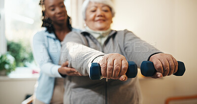 Buy stock photo Physio, hands and old woman in clinic with dumbbells, exercise or support for injury rehabilitation. Senior person, healthcare worker and guide with weights for fitness, wellness or physical therapy.