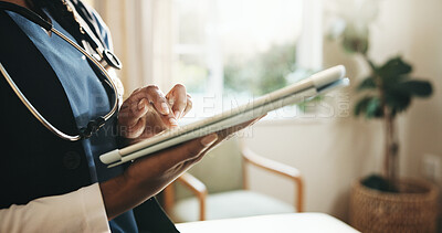 Buy stock photo Doctor, hands and scroll in clinic with tablet, medical research and website for telehealth chatbot. Healthcare worker, woman and typing in hospital with tech, app and AI innovation for admin tasks.