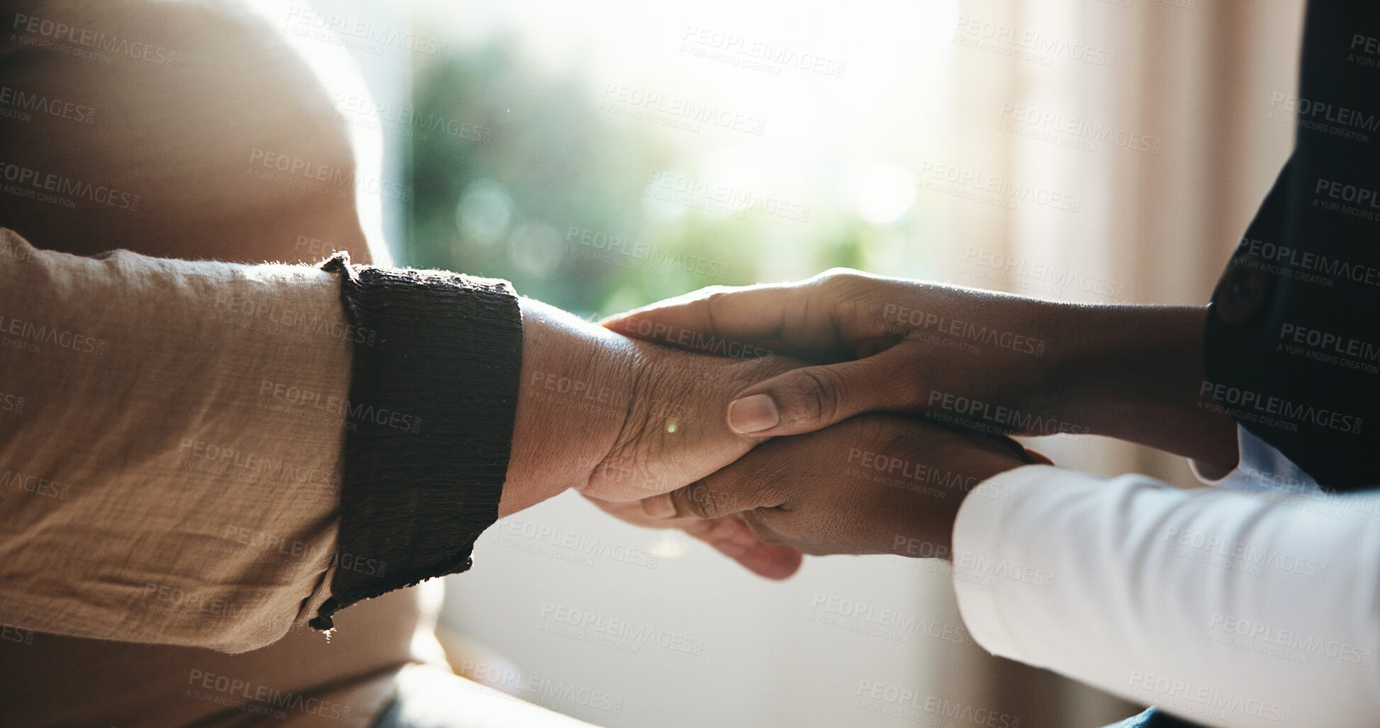 Buy stock photo Empathy, holding hands and support with people in home together for bonding, healthcare or love. Counseling, sympathy and trauma with nurse consoling patient in apartment for comfort or security