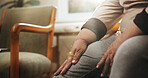 Injury, hands and old woman in clinic with knee pain, fibromyalgia symptoms and muscle discomfort. Hurt, senior person and joint inflammation in doctor office with sprain, osteoporosis or healthcare.