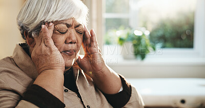 Buy stock photo Headache, stress and senior woman in home with tension for overthinking, mistake or brain fog. Overwhelmed, migraine and elderly person in retirement with temple massage for fatigue in house.