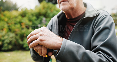 Buy stock photo Hands, cane and thinking in park with senior person in retirement, balance aid and reflection space. Old man, memory or nostalgia for past perspective, relax in nature or walking stick for mobility