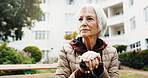 Senior, woman thinking and retirement outdoor with cane, balance aid and space for reflection. Pensioner, memory or nostalgia for past perspective, relax in nature or walking stick for mobility