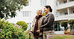 Help, caregiver and old woman with cane at backyard for support, smile and connection. Retirement home, walking stick and person with carer in garden for rehabilitation assistance, happy and wellness