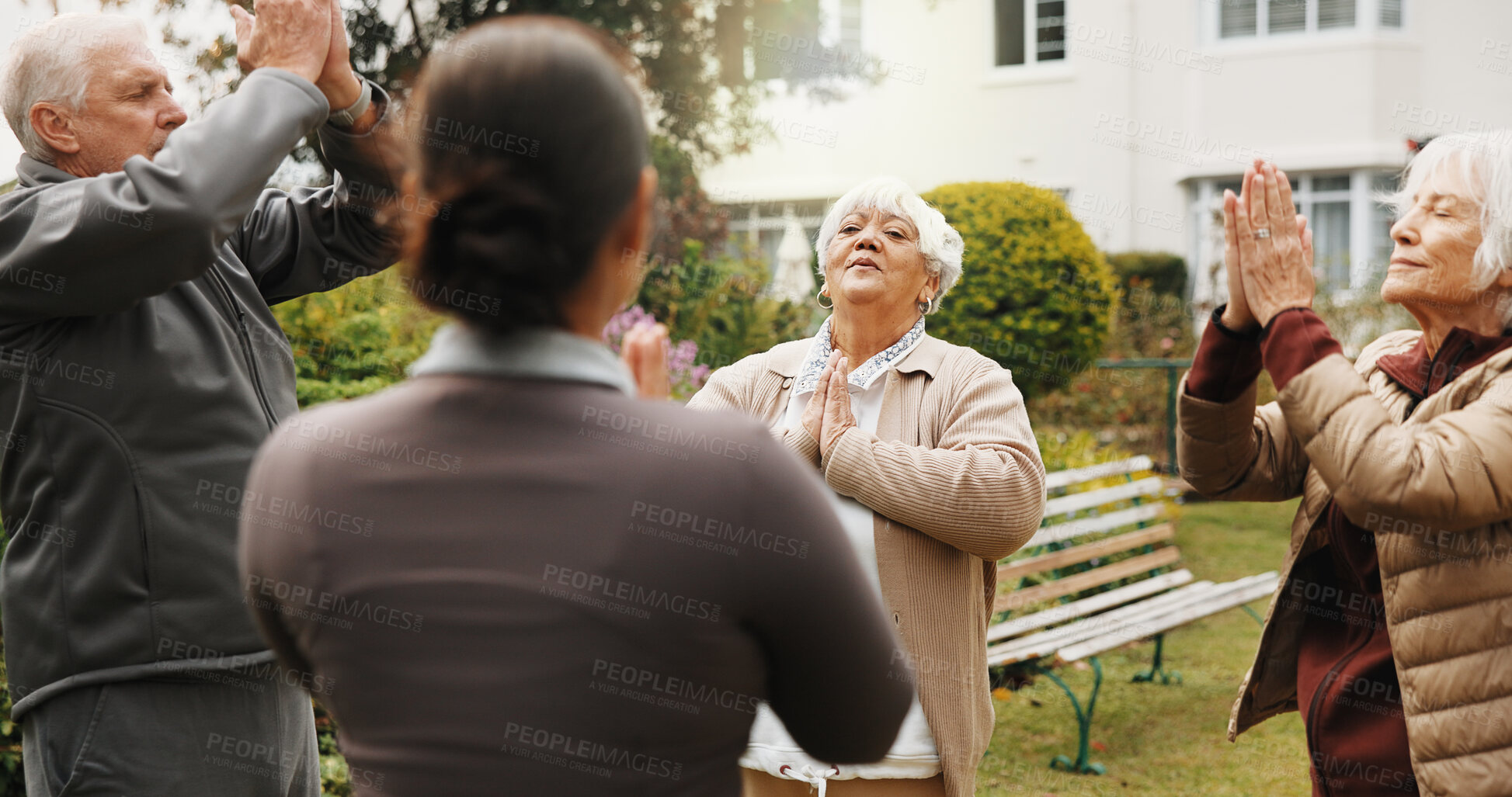 Buy stock photo Woman, physiotherapist or meditation with senior group in garden for mindfulness together. Female person, instructor or elderly people with breathing exercise for health or wellness in retirement