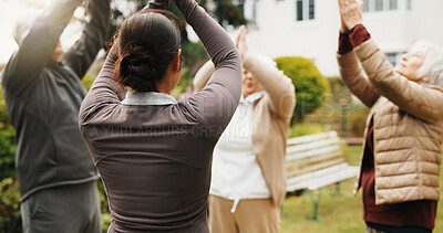 Buy stock photo Woman, physiotherapist or stretching with elderly group in garden for outdoor exercise together. Female person, instructor or senior people with body warm up for health or wellness in retirement