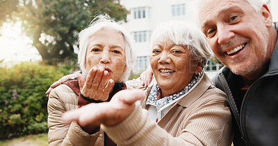 Buy stock photo Friends, love and blow kiss with old people for happiness, connection and support at backyard. Retirement community, man and portrait of women with care gesture, smile and wellness at home garden