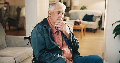 Buy stock photo Thinking, serious and senior man in wheelchair at house with memory, remember or planning retirement. Choice, decision and elderly person with disability in living room with reflection or nostalgia.